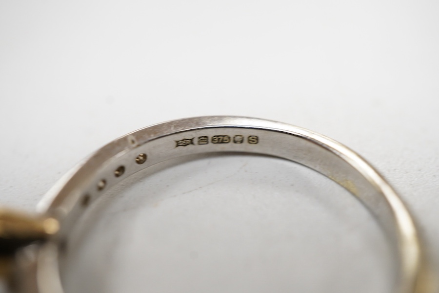 Two modern similar 14ct gold and diamond rings, one in yellow gold, with three collet set stones and six smaller stones, size P/Q, the other set in 9ct white gold, with two collet set stones and eleven smaller stones, si